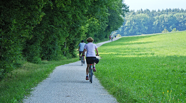 Persone In Bicicletta